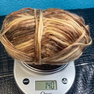 140g Untagged Super Chunky Fuzzy Variegated Brown and Tan Yarn Skein